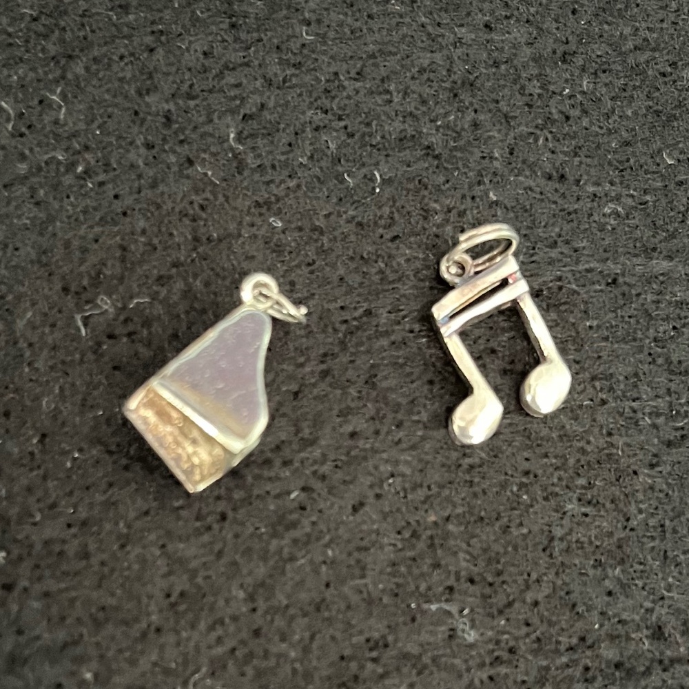 CHARMS OR PENDANTS